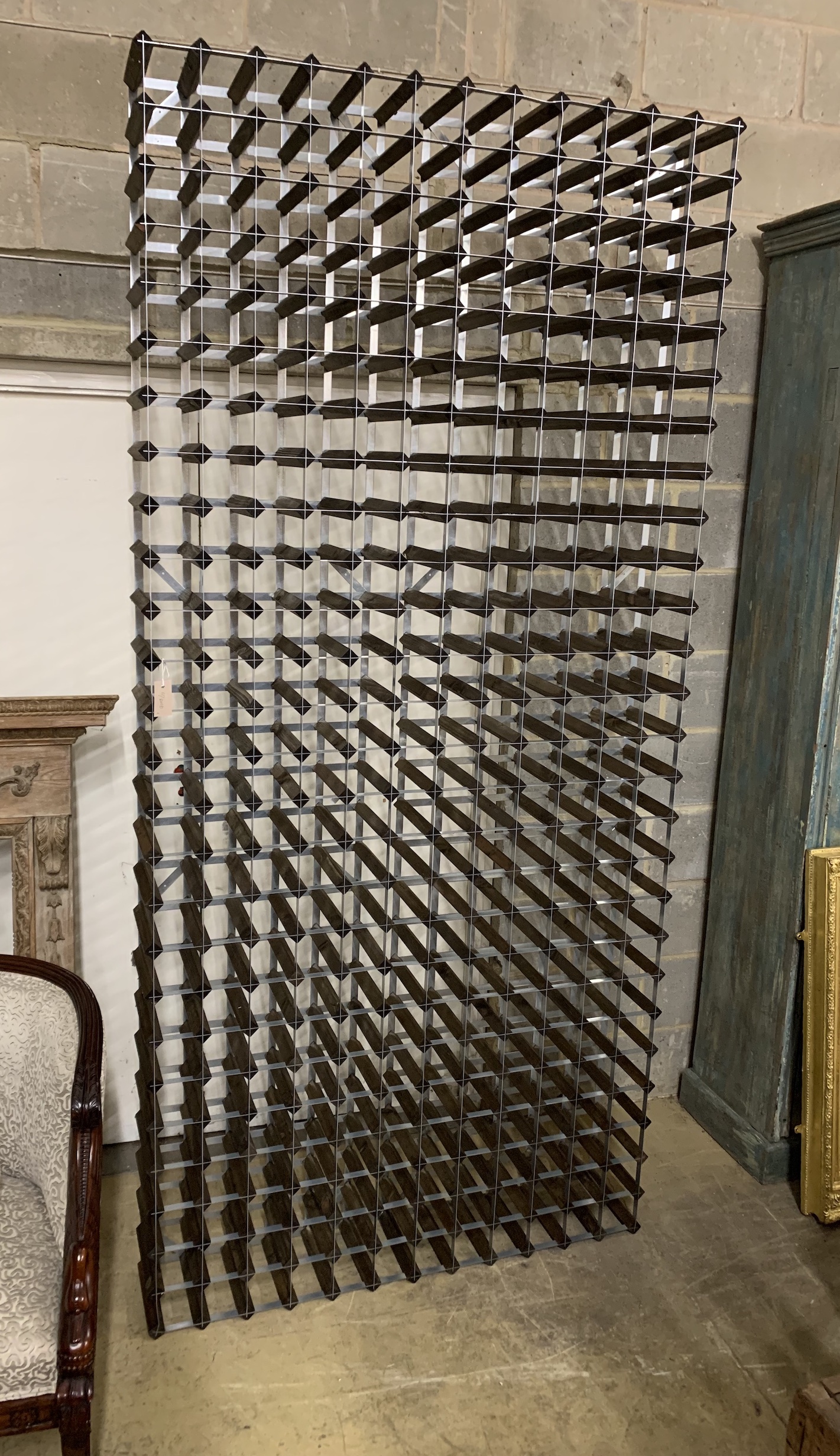 A modern 312 bottle wine rack, width 255 x height 120cm